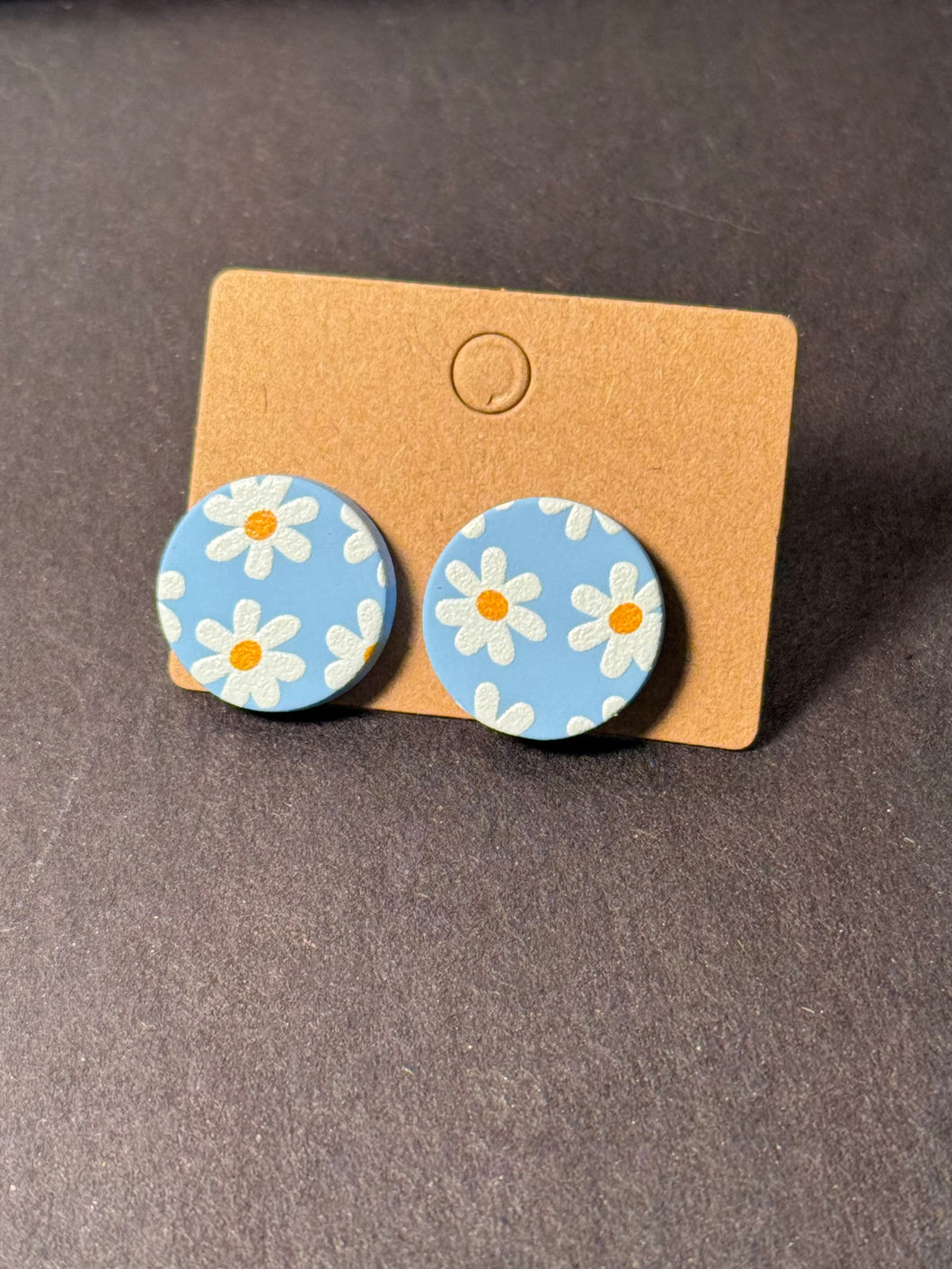 Blue and white flower studs