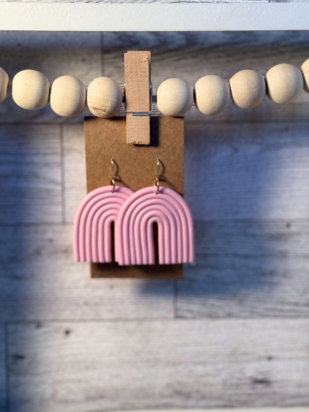 Light pink arch earrings